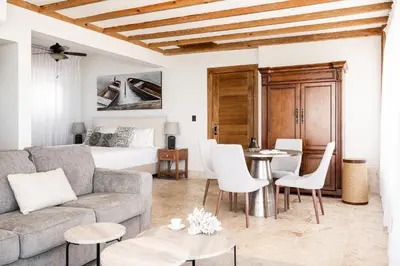 a living room with a couch and a table at Cofresi Hills Residence in Gurapito