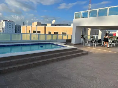a balcony with a swimming pool on a building at Torre Harriannet XIII in Santo Domingo