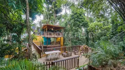 a house in the middle of the forest at El Yaguacil villa in Jarabacoa