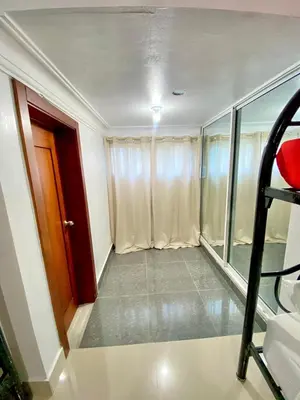 an empty room with a door and a window at Complejo Ecoturistico Rancho Cielo in Licey al Medio