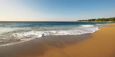 a view of the ocean from the beach at Infiniti Blu Luxury Ocean Front Condos in Sosúa