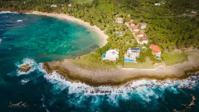 an aerial view of an island in the ocean at The Cove Apartment Second Floor 5C in Santa Bárbara de Samaná