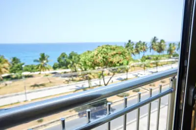 a view of the beach from a window in a room at LA VlTA E' BELLA in Los Mameyes