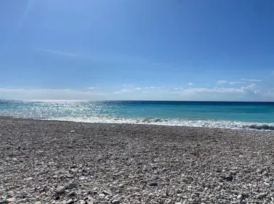a rocky beach with the ocean in the background at Beachfront Apartment, Quiet 4 Beds, 1 Bath, AC, Wi-Fi, Hot Water, in Paraiso near Los Patos in Paraíso
