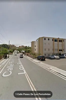 an empty street with cars parked on the road at 8 Santiago Monumental Area Cozy and lovely to enjoy 3 bedrooms Apart transportation 24 hours in Santiago de los Caballeros