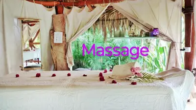a bedroom with a white bed with roses on it at Jungle Hut near Beach - Nature Lovers in Las Terrenas