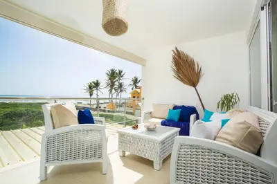 a living room with a view of the ocean at Amazing Ocean Front - 2 bedroom Apartment (117 sq meters) in Cabarete