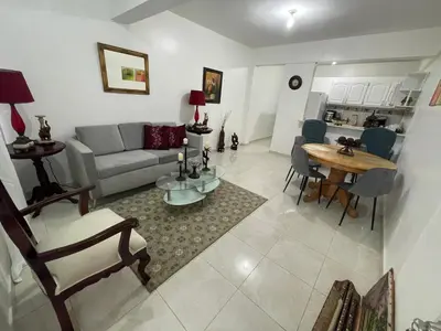 a living room with a couch and a table at hospedaje de marant 2 in San Felipe de Puerto Plata