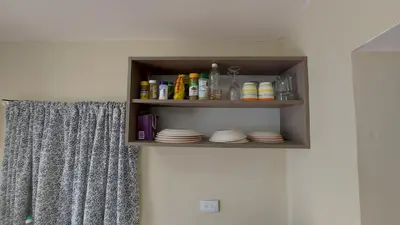 a shelf on a wall with plates on it at Casa Kamanda, Zona Colonial, Santo Domingo in Santo Domingo
