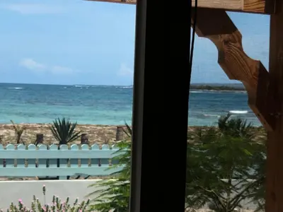a view of the beach from a window at Punta Rucia Cristal Beach in Punta Rucia