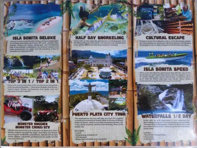 a sign for the water park at the disneyland resort at CortLang Vacation Rentals, El Pueblito in San Felipe de Puerto Plata