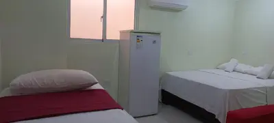 a hospital room with two beds and a window at Cozy Double Room in Santo Domingo Este in La Viva