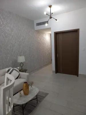 a living room with a couch and a ceiling fan at Brickell Hotel apto g 08 Santo Domingo Bella Vista in Santo Domingo