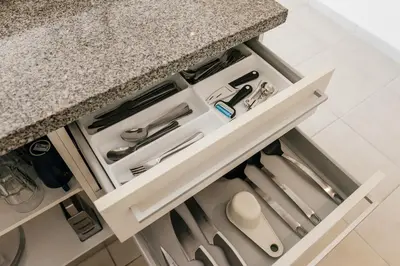 a kitchen with white drawers and a counter at Apartment Almas Iberosta Bavaro 3BDR with Pool & Private Beach in Punta Cana