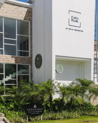 a building with a sign that reads camp i heart at Pool & Golf View Condo Inside Hard Rock Area in Punta Cana