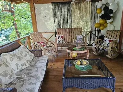 a living room with a couch and a table at Hacienda Claro de Luna 3 Bedrooms in Jarabacoa