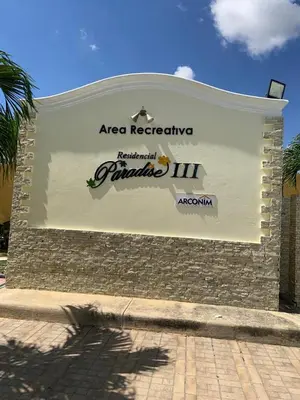 a large sign on the side of a building at Luxury apartment with Pool in Santiago de los Caballeros