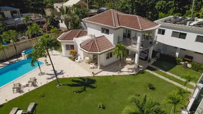 an aerial view of a house with a swimming pool at Casa Blanca - White House in Cabarete