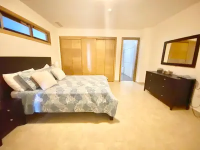 a bedroom with a bed and a television in it at 703 Marbella 2 bedrooms Beachfront Beautiful Apartment in San Pedro de Macorís