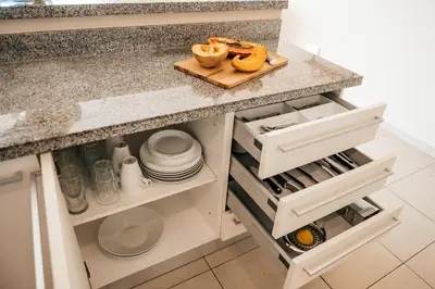 a kitchen counter with a cutting board and some food at Special Offer, Iberostar Apartment Milagro 3BDR Pool, Beach in Punta Cana