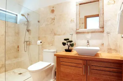 a bathroom with a toilet and a sink and a shower at 3 Bedroom Pool Villa 50M To The Beach in Las Terrenas