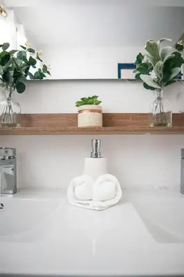 a bathroom sink with a towel on the counter at Salt Air & City Vibe Awaits! Just Minutes to Beach in San Felipe de Puerto Plata