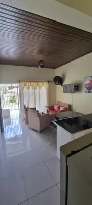 a kitchen and a living room with a couch at Margarita in Río San Juan