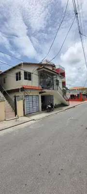 a building on the side of a street with at Margarita in Río San Juan