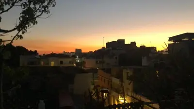 a view of a city skyline at sunset at Centrico ciudad colonial in Santo Domingo
