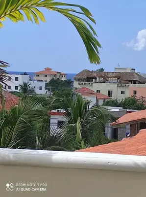 a view from the balcony of a city with buildings at Venere Bayahibe by Mireya in Bayahibe