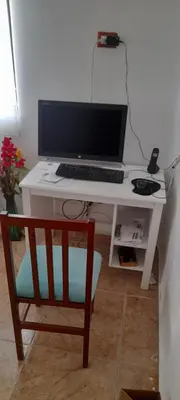 a white desk with a computer on top of it at Villa Isabel, NO SMOKING, cerca embajada USA in Santo Domingo