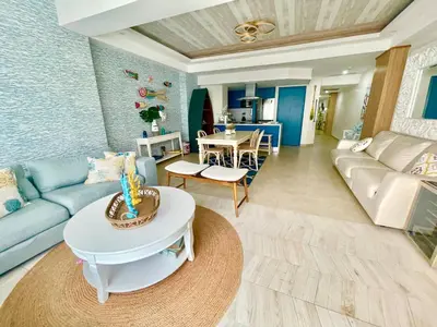 a living room with a couch and a table at 2 Bedroom At The Marbella Towers Beachfront in Juan Pedro