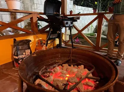 a camera is taking a picture of a grill at Villa Zarina - Polo Barahona in Polo
