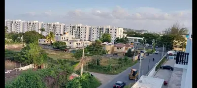 an aerial view of a city with buildings at 2 Bedrooms at Baia Residences in Santiago de los Caballeros