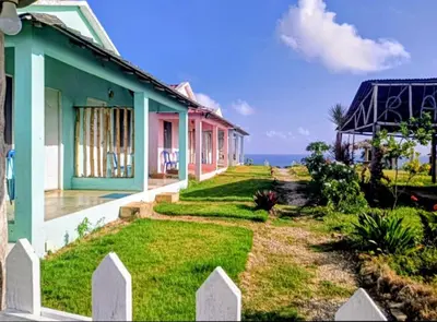 a house with a view of the ocean at Oasis en la naturaleza Rancho alto bonito in Las Galeras