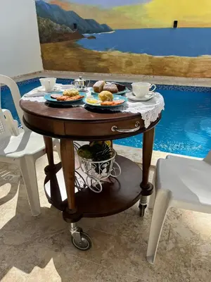 a table with plates of food on top of it at RG Sol 1 in Pantoja