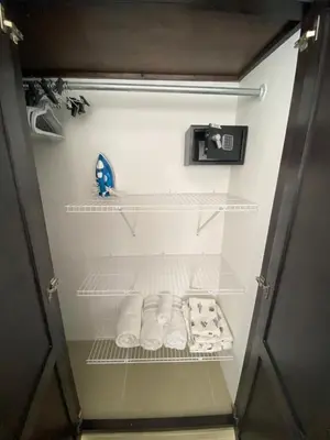 an open refrigerator with some towels in it at Bridget Place in Bayahibe